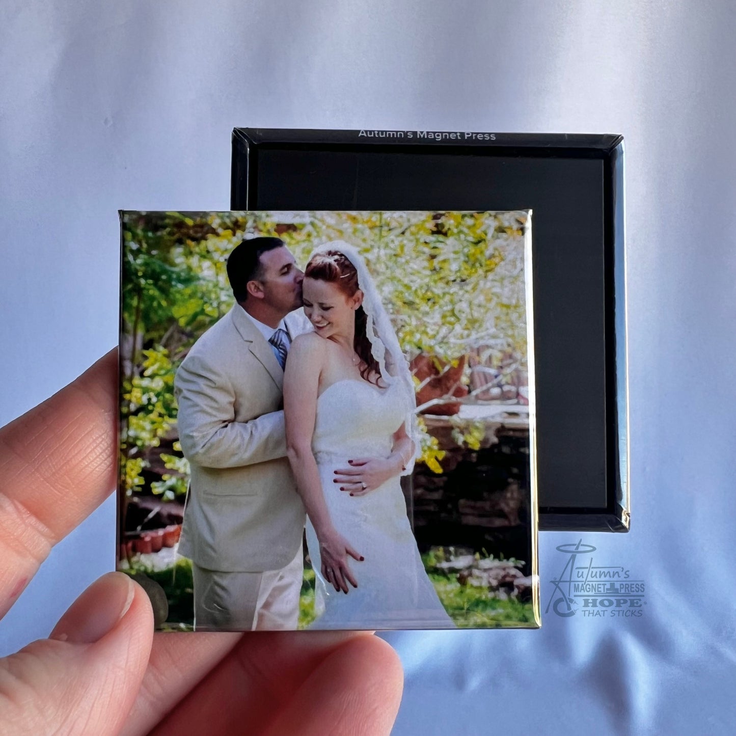 2.5 inch square custom photo magnet showing front photo and magnetic backing