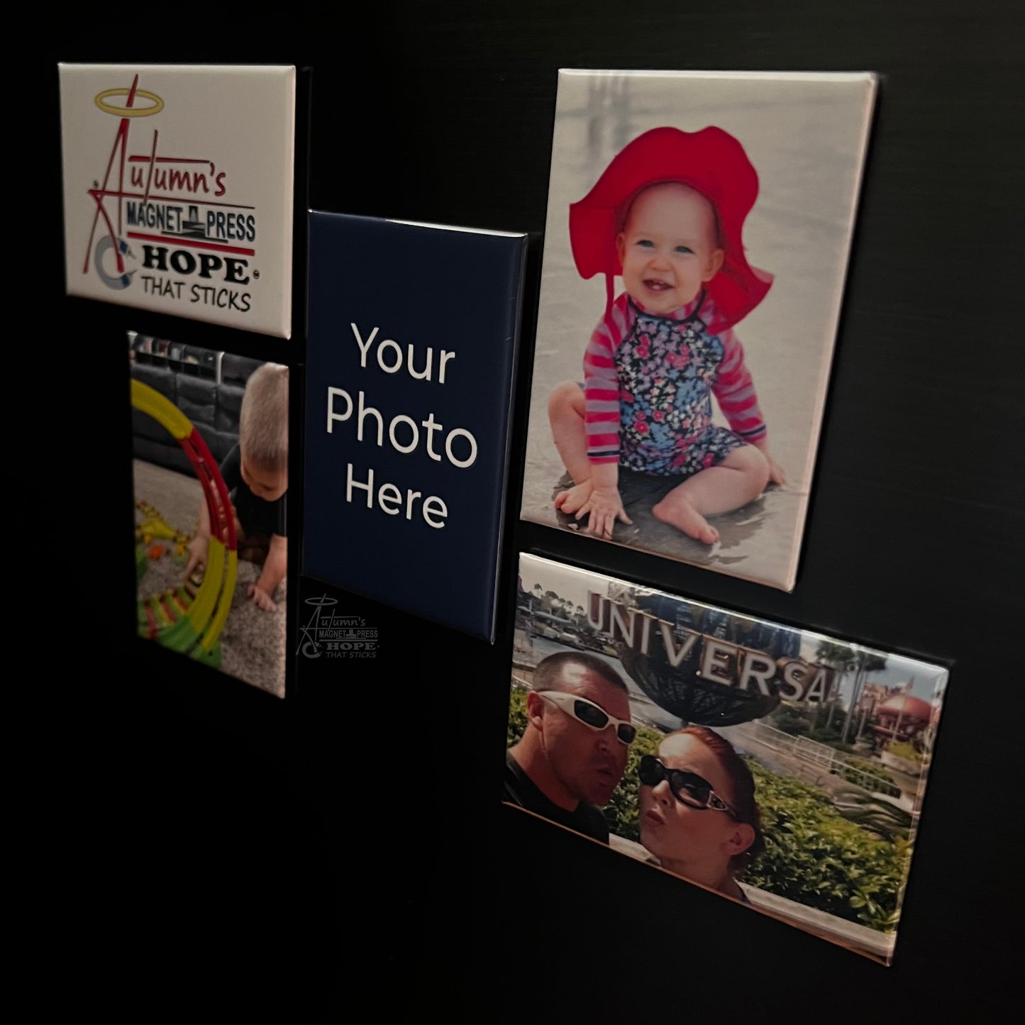 Set of 5 rectangle custom photo magnets showing family, baby, and vacation photos on a dark metal surface