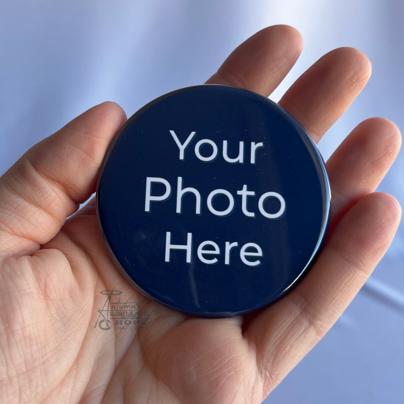 2.5 inch round custom photo magnet held in hand