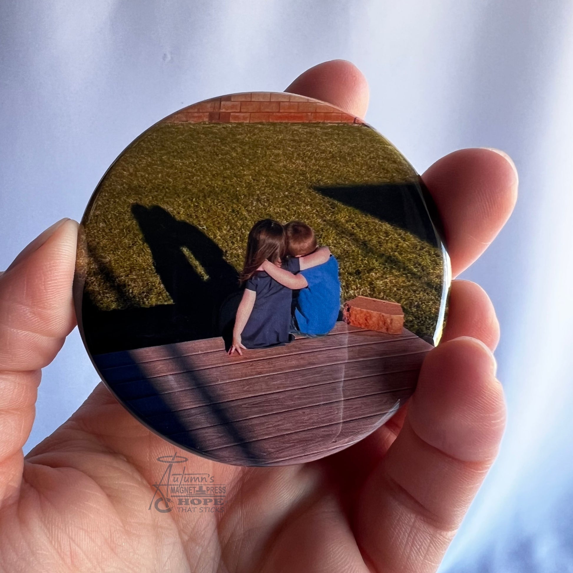 2.5 inch round custom photo magnet displaying real printed photo quality