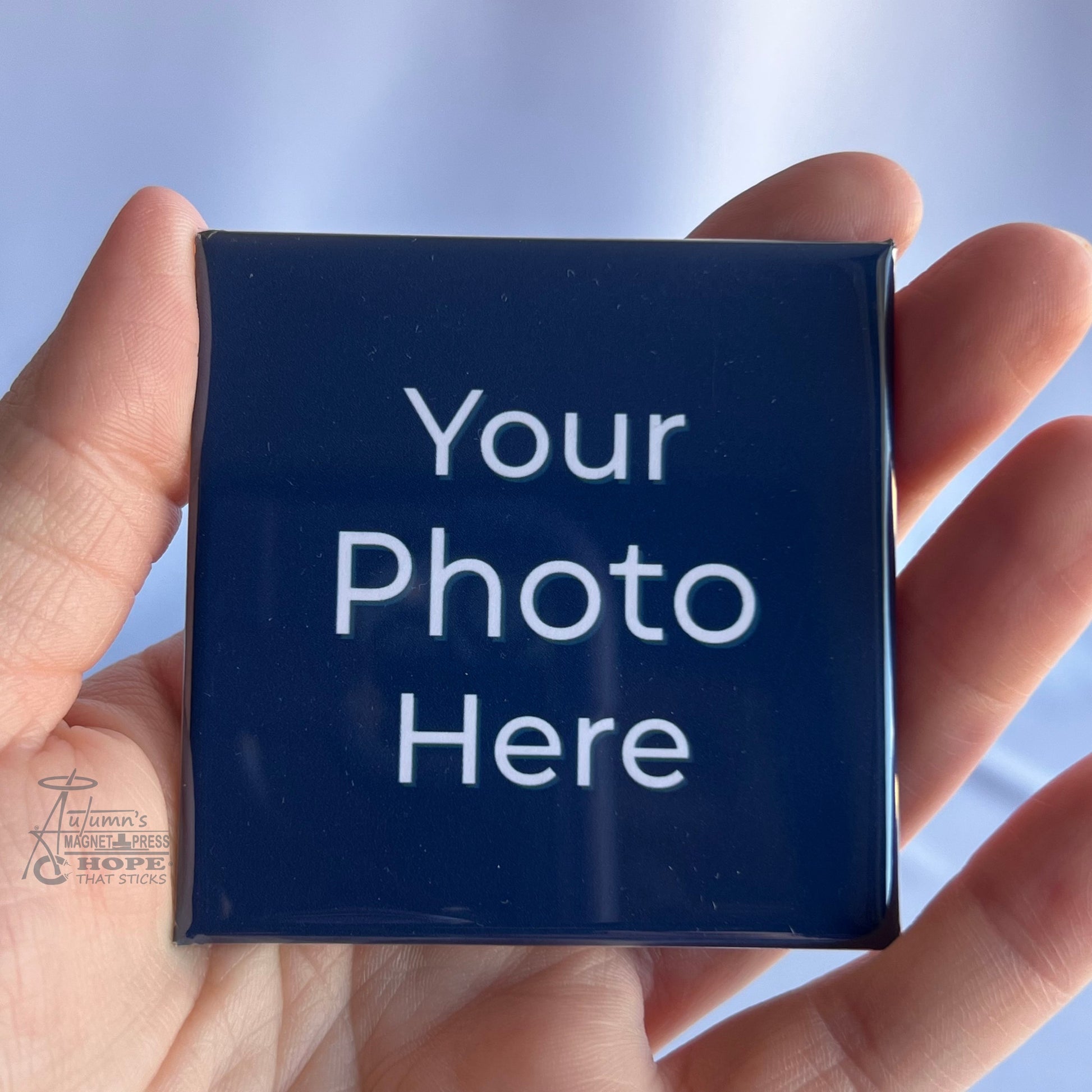 2.5 inch square custom photo magnet held in hand