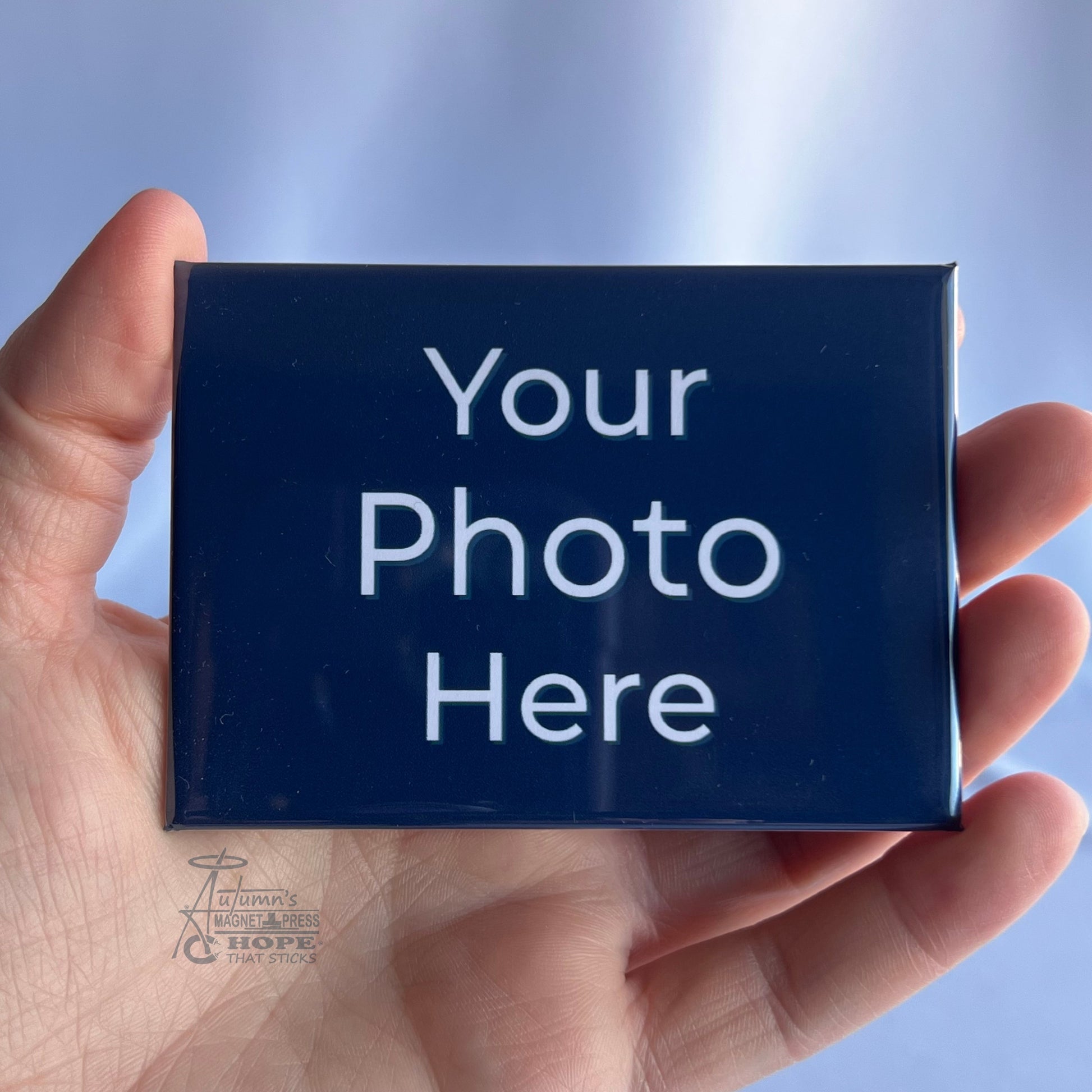 2.5x3.5 horizontal premium rectangle custom photo magnet held in hand