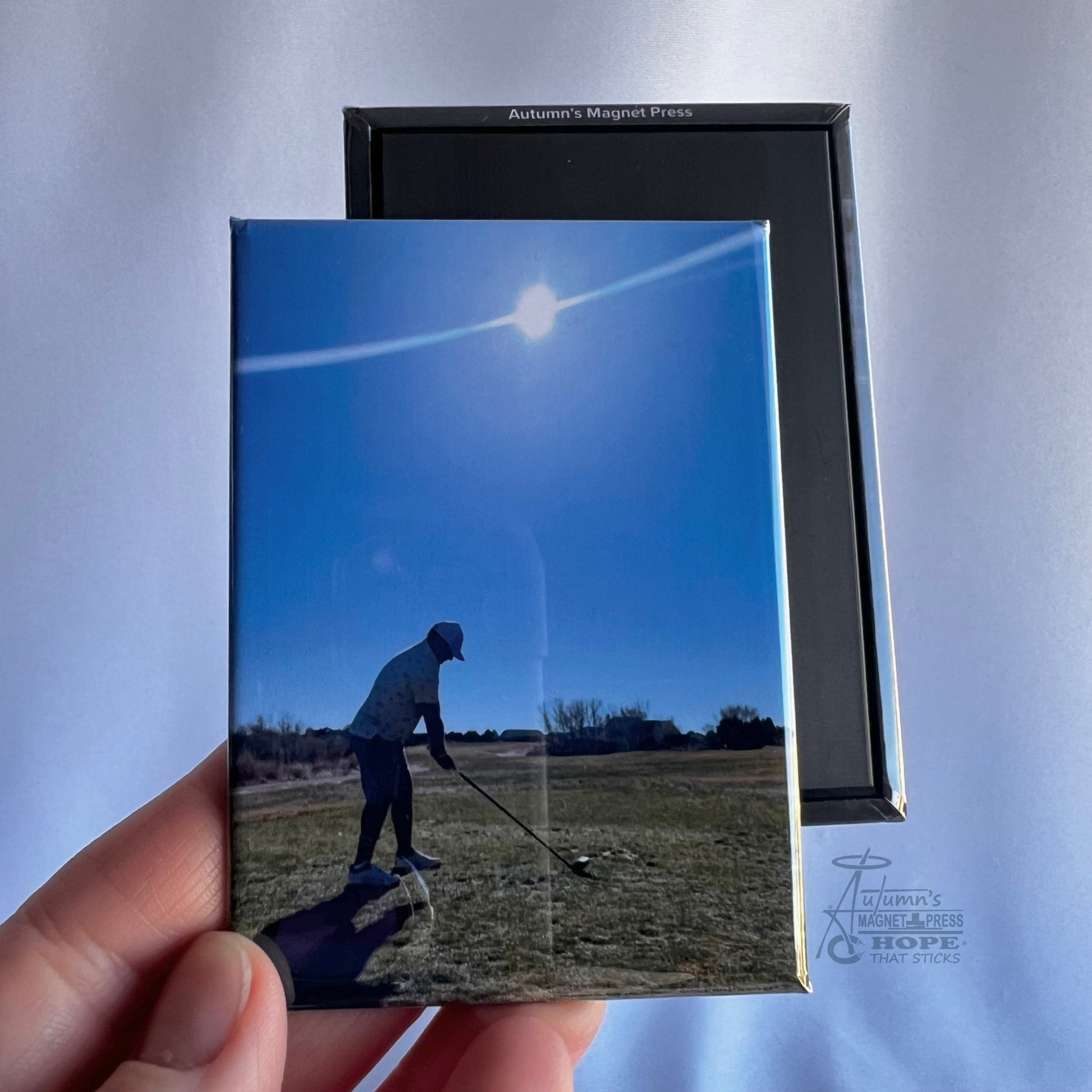 2.5x3.5 premium rectangle custom photo magnet showing front photo and magnetic backing