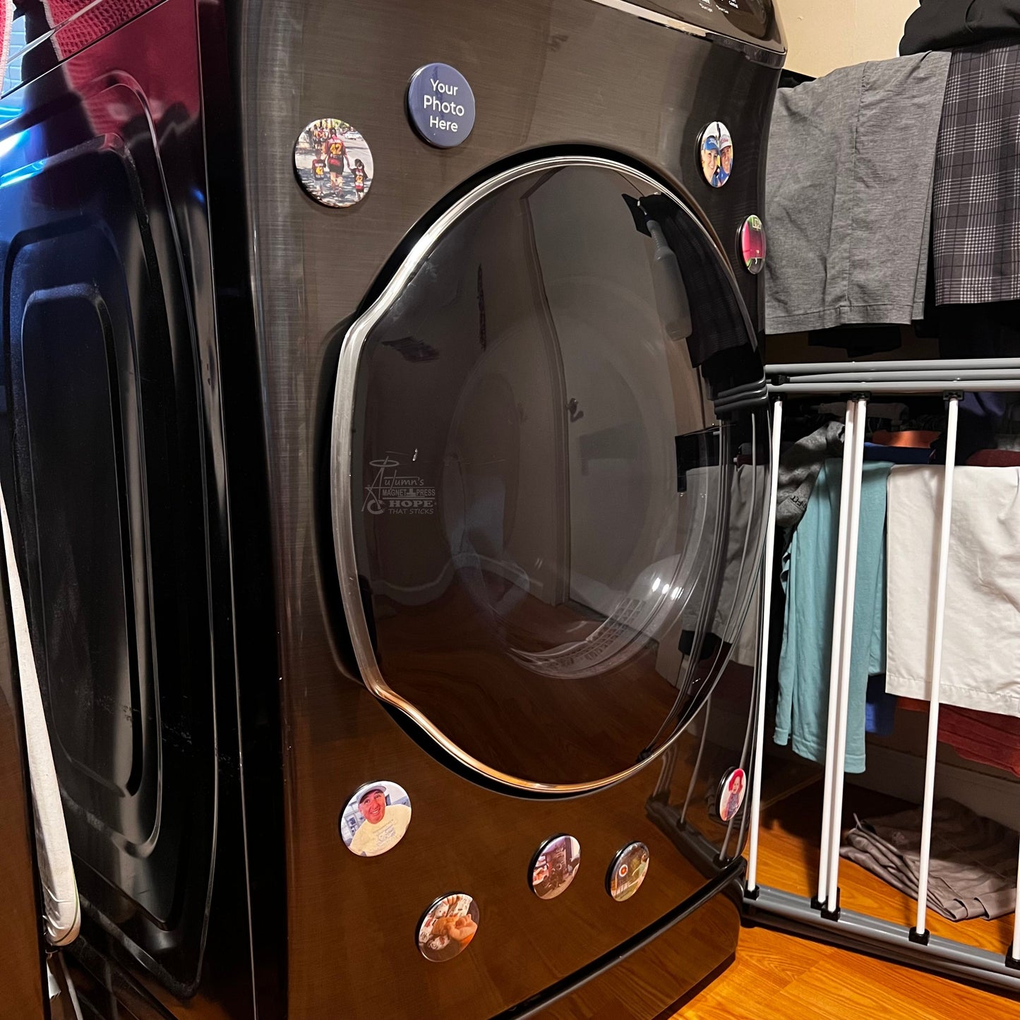 Round set of 9 custom photo magnets arranged together on a washer and dryer showing everyday family moments.