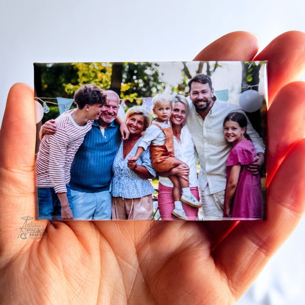Custom family photo magnet featuring multiple generations gathered together outdoors during a special family celebration.