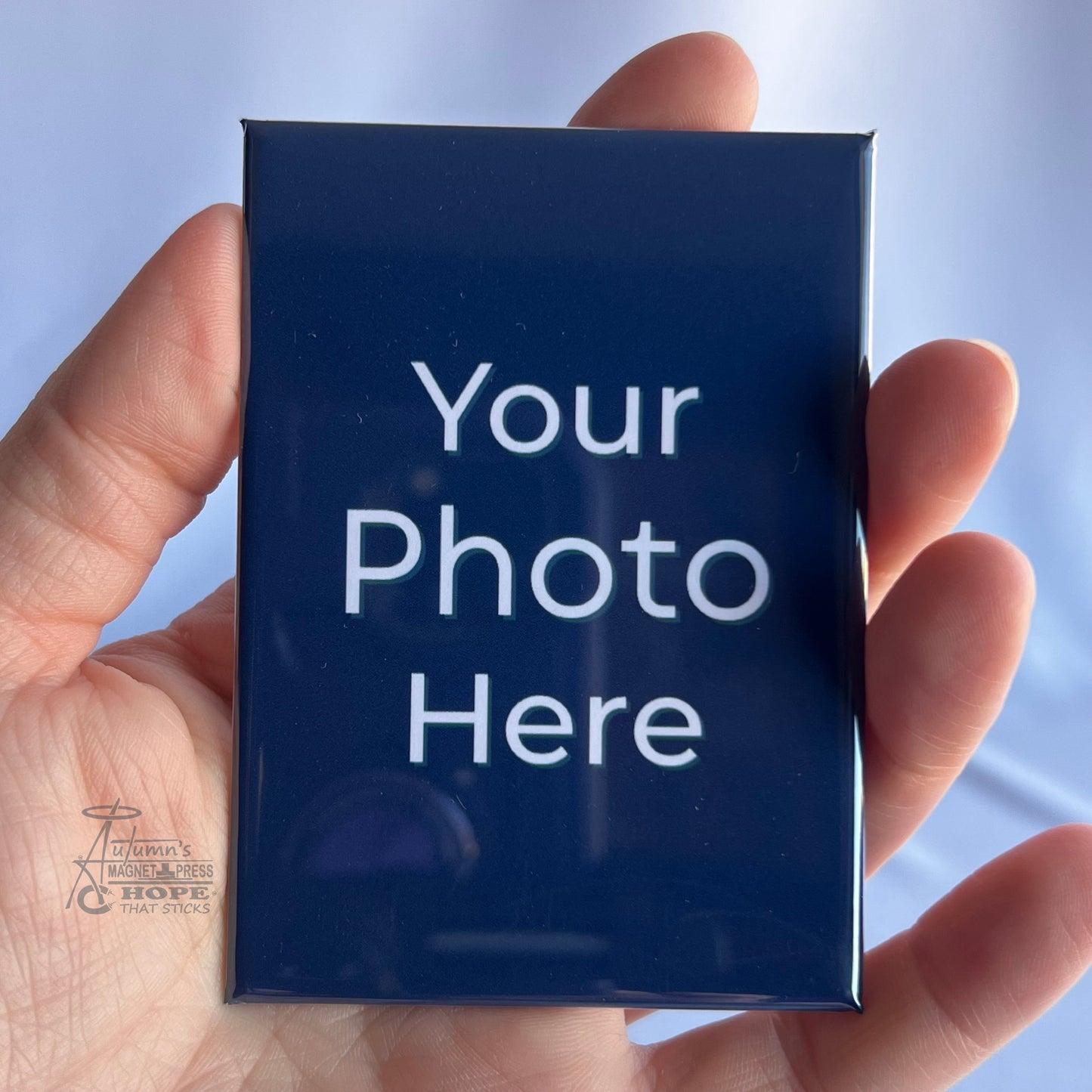 2.5x3.5 premium rectangle custom photo magnet held in hand