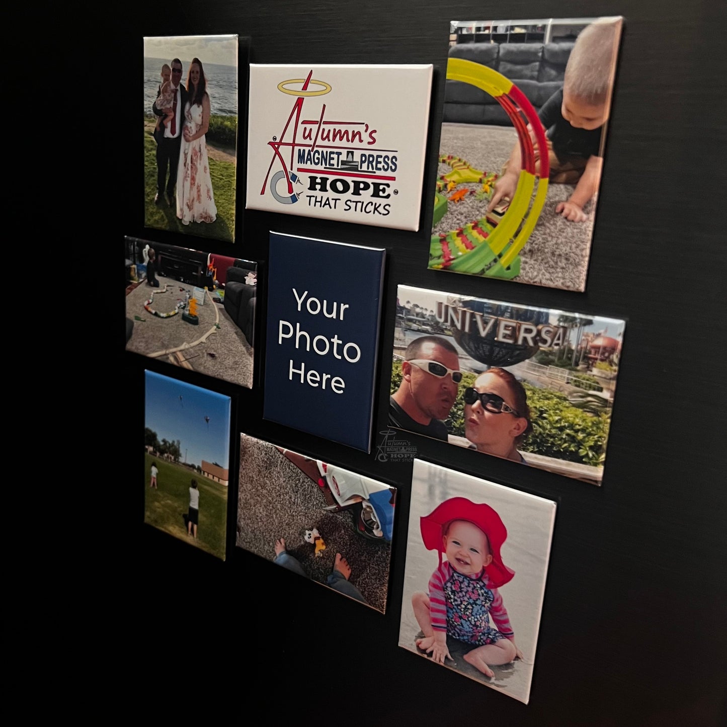 Set of 9 rectangle custom photo magnets arranged as a family photo collage on a dark metal surface